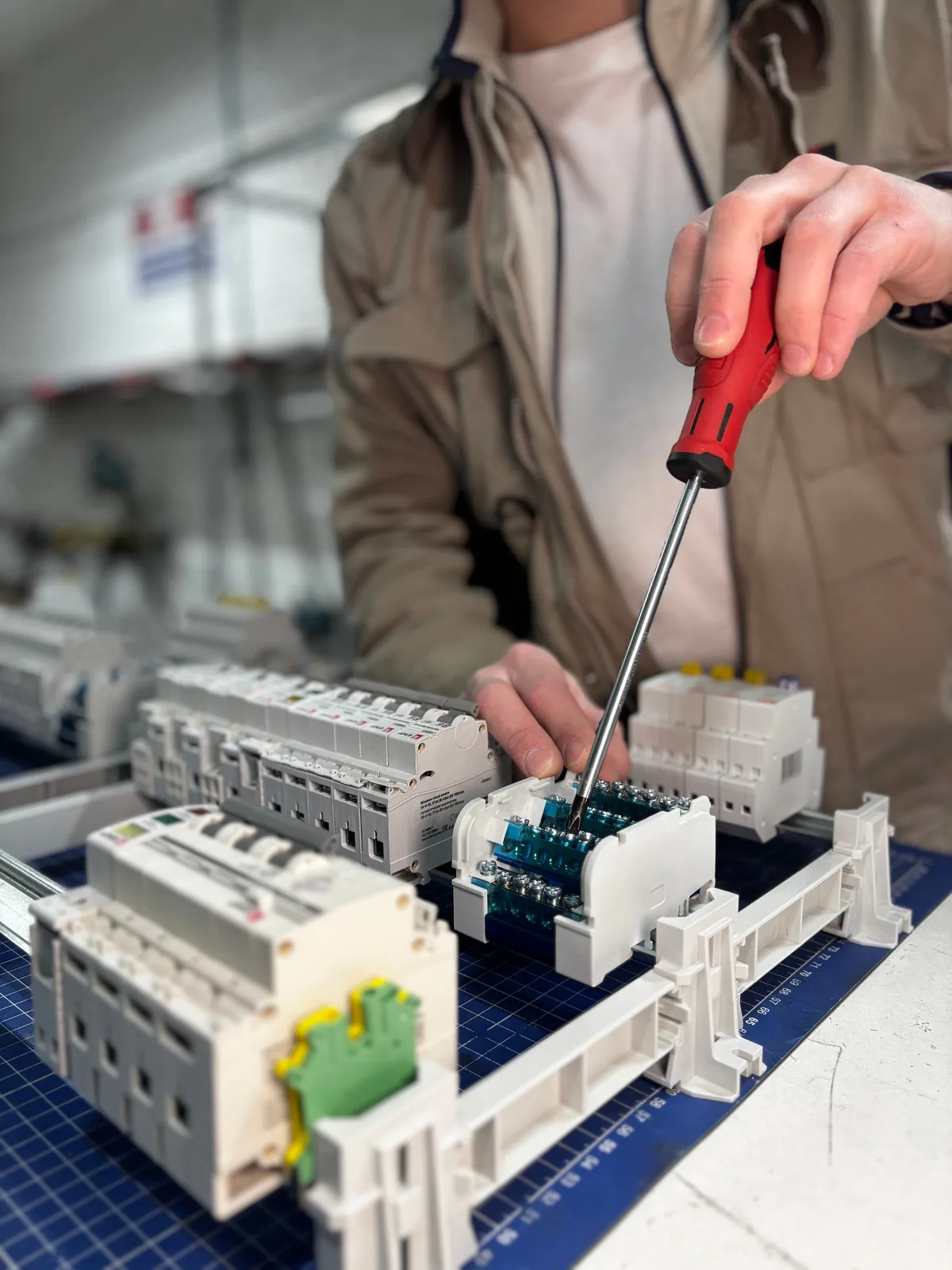 Breakers assembled on a DIN rail before installation, for licensed electrician in Abbotsford