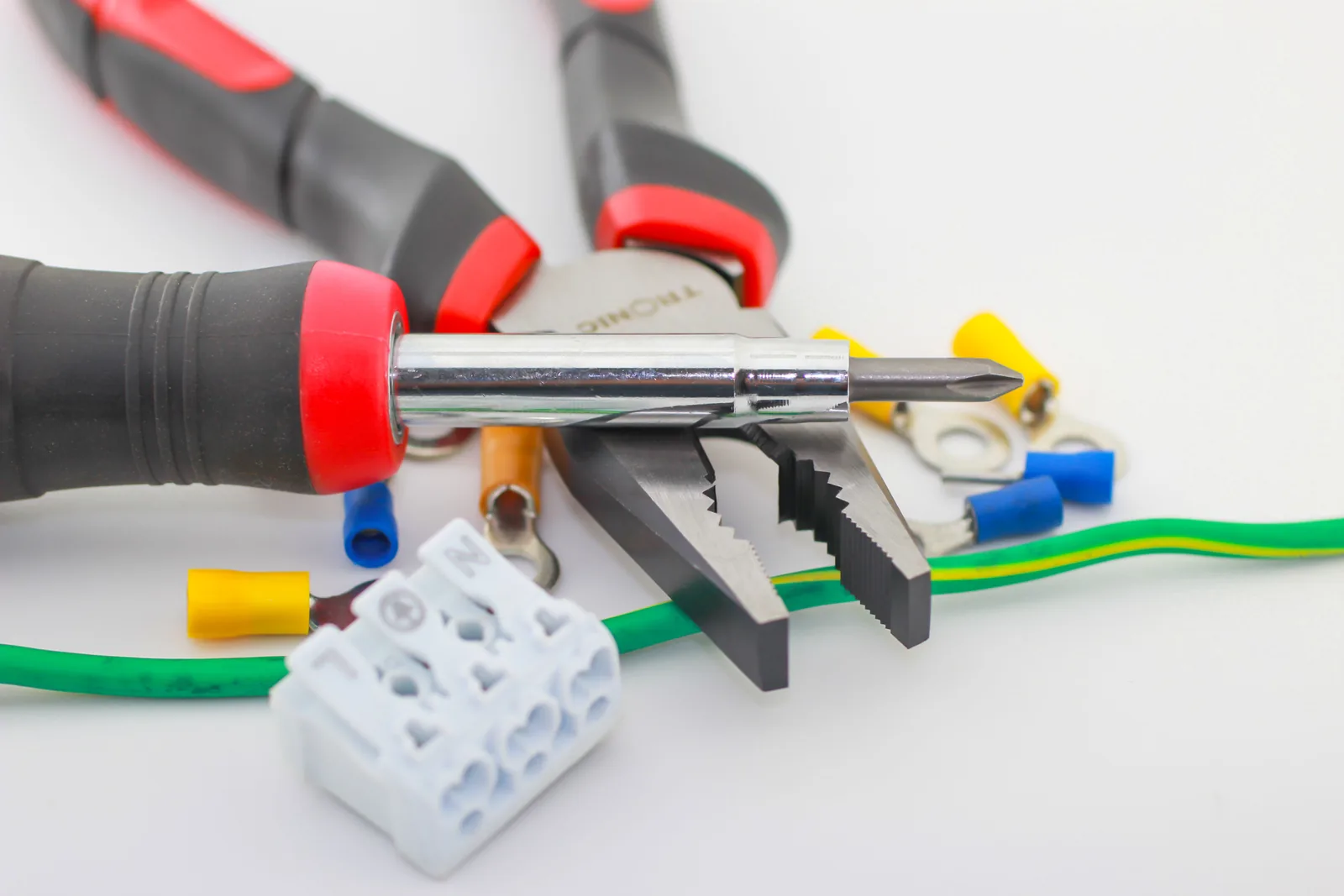 Pliers, a screwdriver, ferrules and a connector block, for electrician in Abbotsford