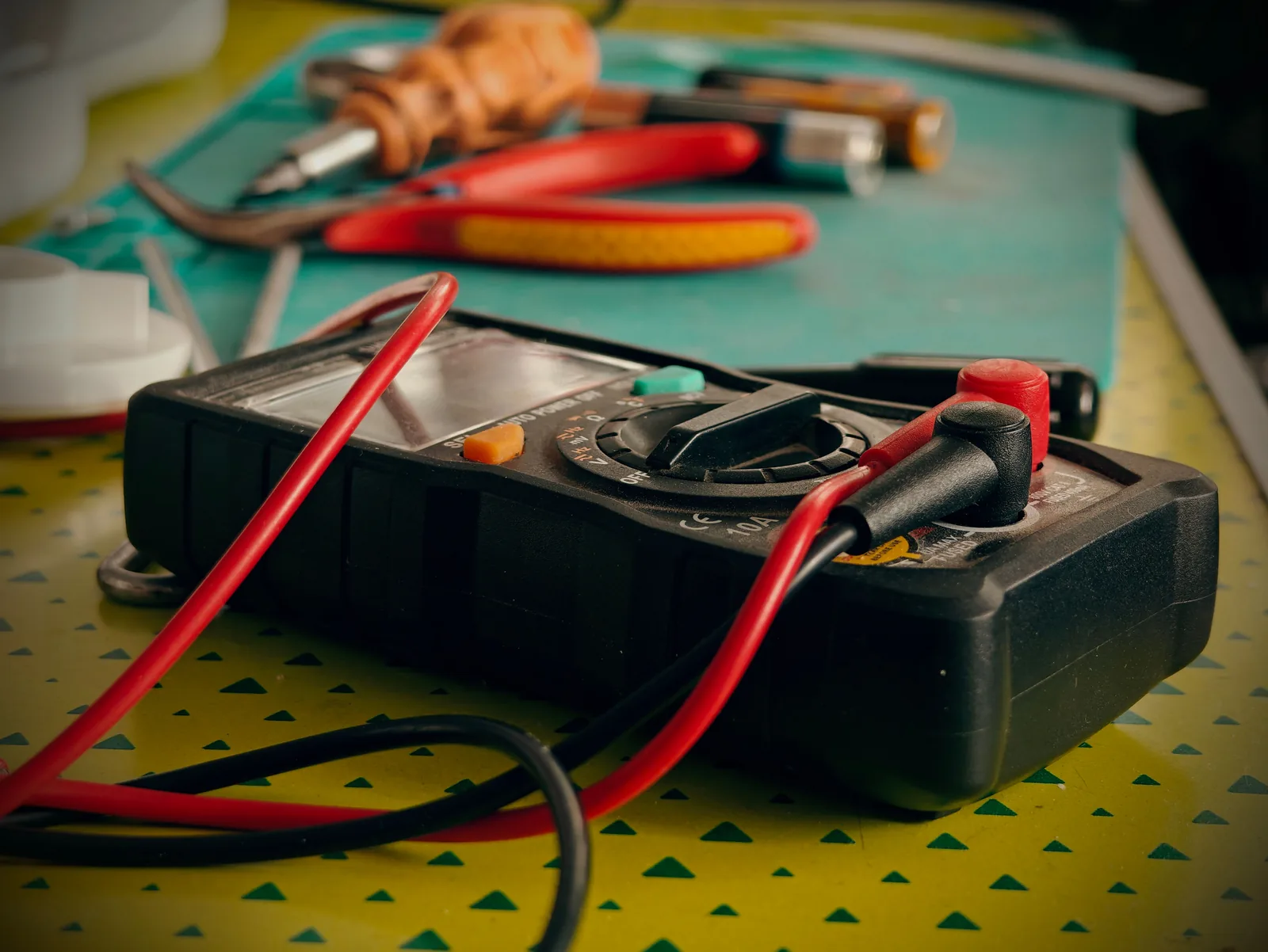 A multimeter and hand tools ready for a diagnostic visit, for electrician in Abbotsford